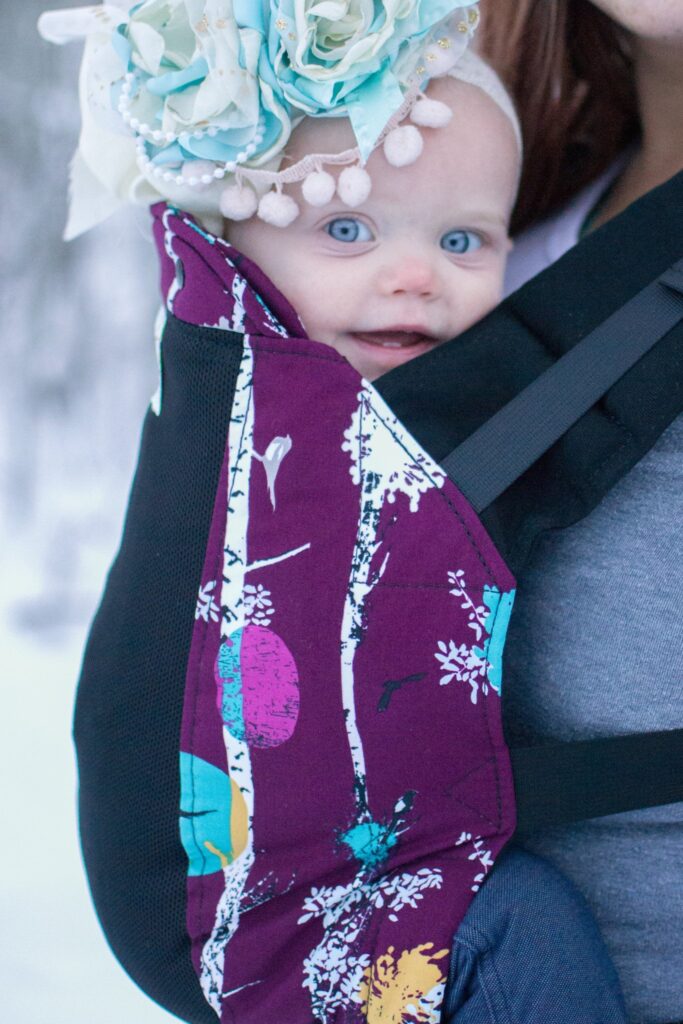 baby smiling at camera